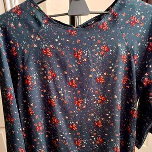 Green flowered blouse